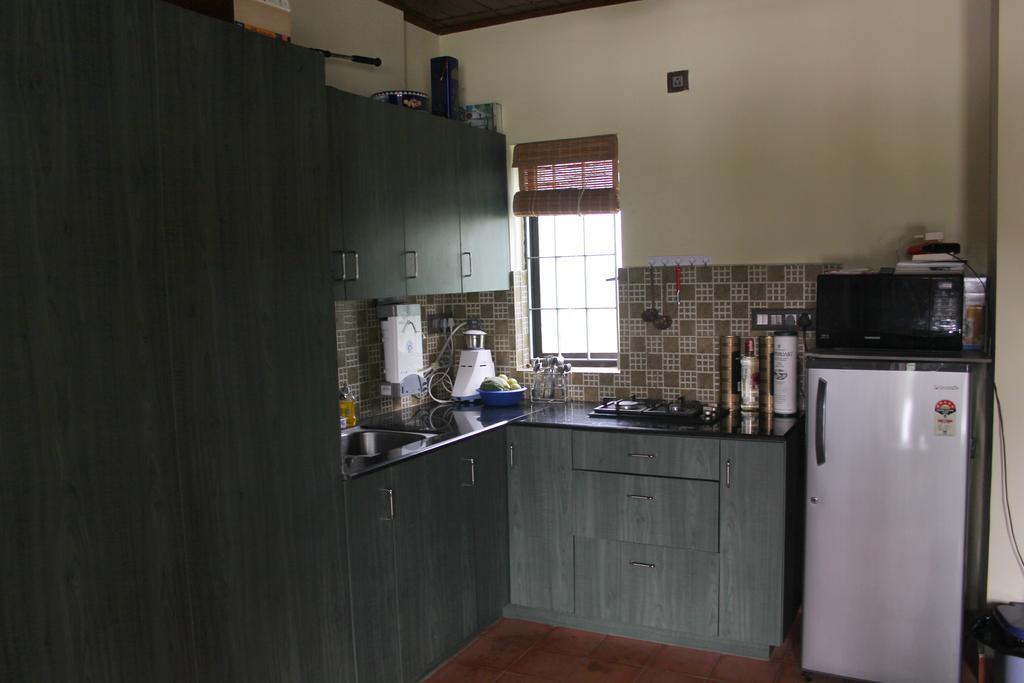 Bed and Breakfast Pearl Spot à Nedumbassery Chambre photo
